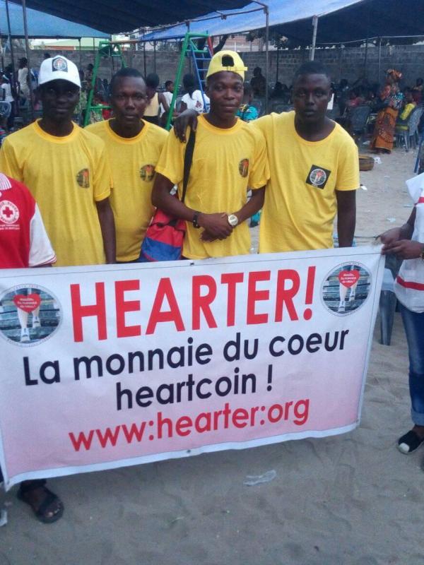 Hearter avec croix rouge Noel des ecoles cotonou - 20/12/2018 lancement monnaie du coeur